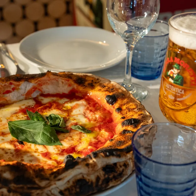 Margherita pizza and beer, restaurant photography London