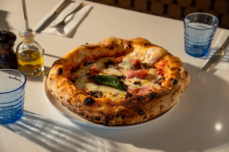Wood-fired pizza menu photo for a London pizzeria